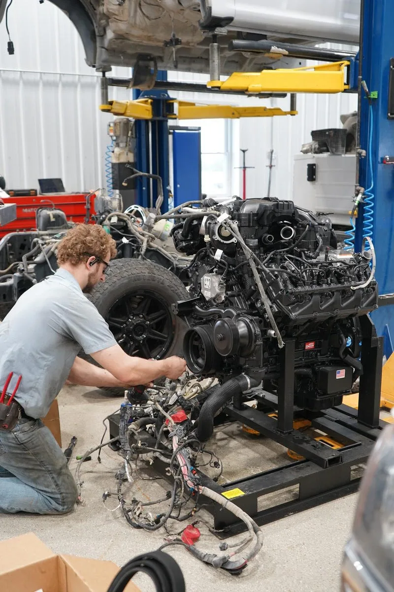 Diesel engine removed from vehicle on stand for rebuild